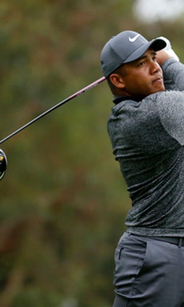 Johnson takes 36-hole lead at rainy Riviera